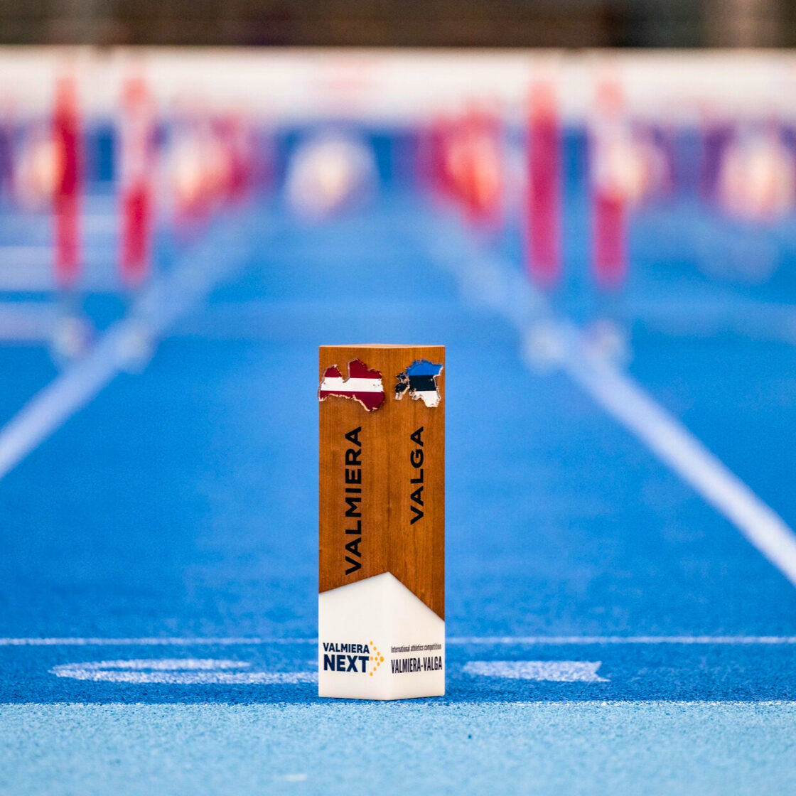 Bespoke traveling trophy made from solid wood and cast epoxy resin.